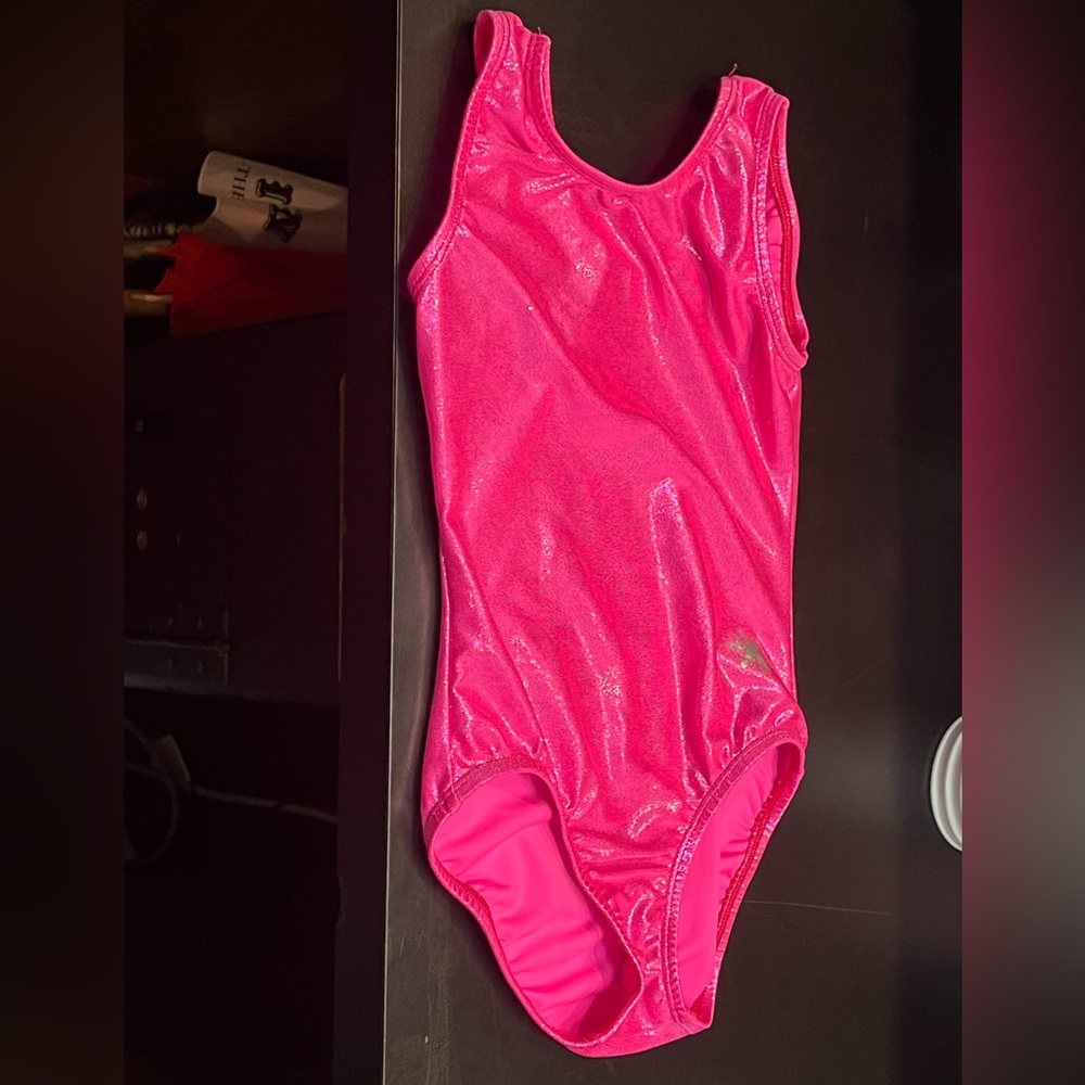 Brand new extra small leotard for kids and adults.